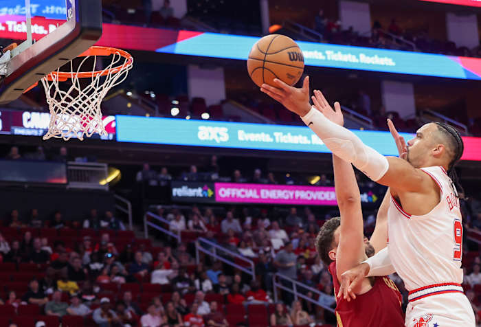 Rockets forward Dillon Brooks (9) shoots against Cleveland Cavaliers forward Georges Niang (20) in the first quarter at Toyota Center.